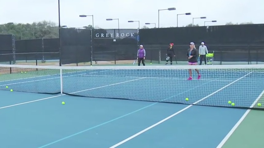 Playing tennis at Grey Rock Tennis Club